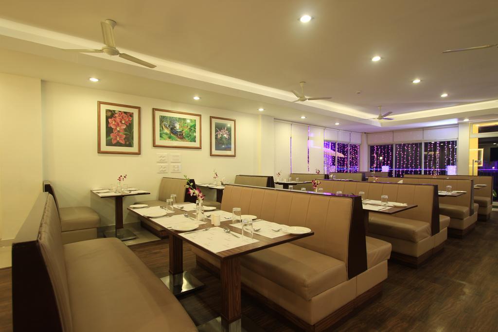 兰花广场酒店-弓弩精品酒店集团 乔奥诺奥尔 外观 照片