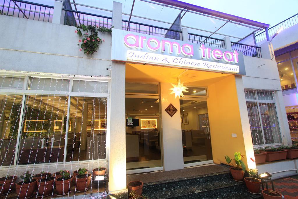 兰花广场酒店-弓弩精品酒店集团 乔奥诺奥尔 外观 照片