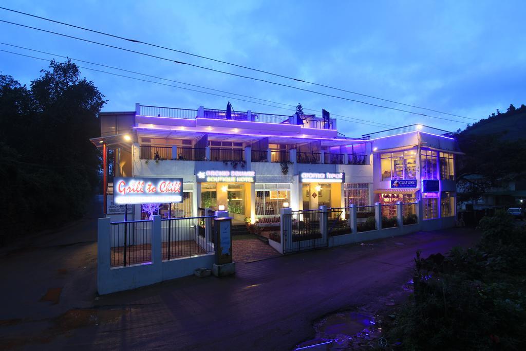 兰花广场酒店-弓弩精品酒店集团 乔奥诺奥尔 外观 照片